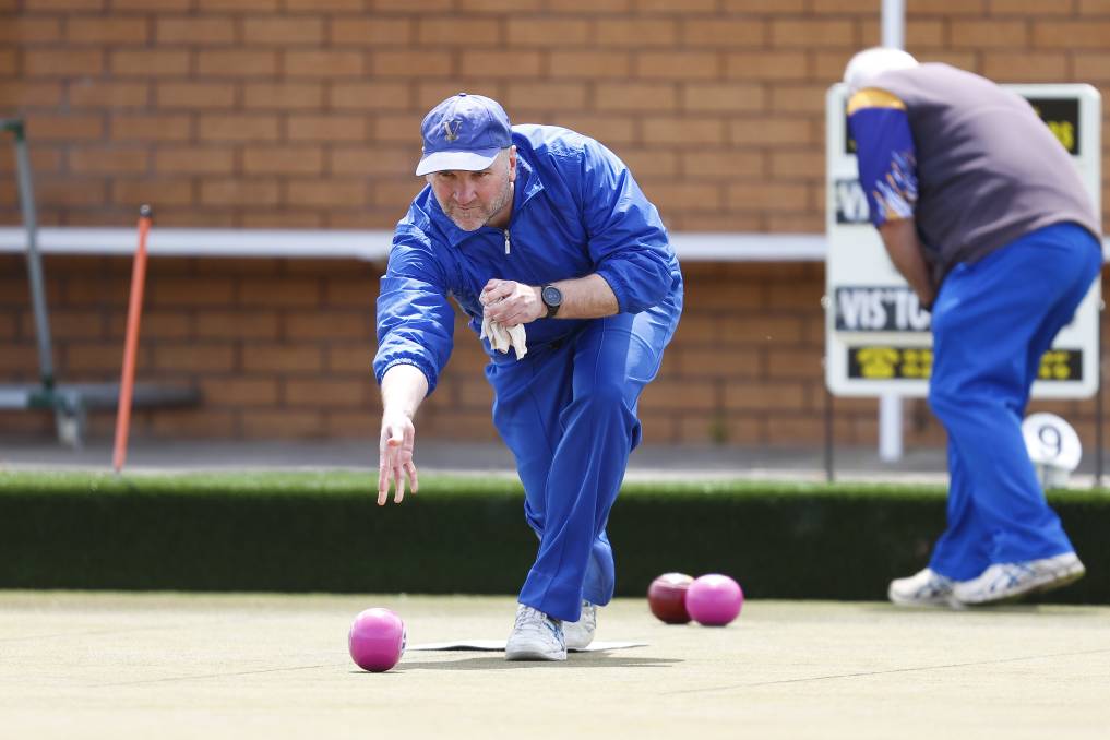 Shaun Clark plays a bowl against Learmonth Bowling Club